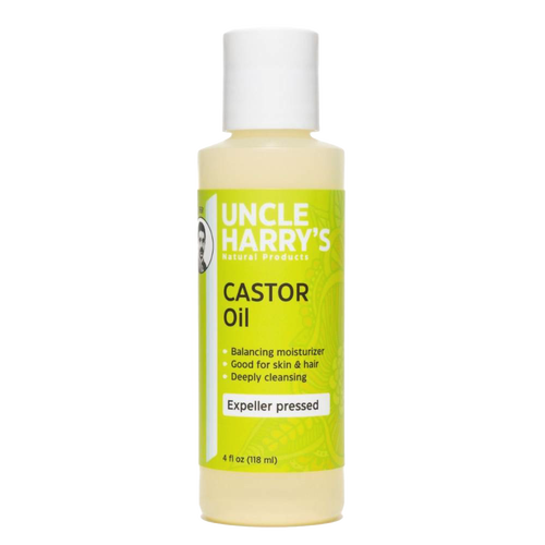 Bottle of Uncle Harry's moisturizing castor oil with yellow-green label highlighting expeller pressed oil, balancing moisturizer for skin and hair, in Health & Wellness and Grooming collections