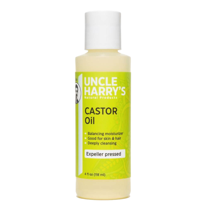 Bottle of Uncle Harry's moisturizing castor oil with yellow-green label highlighting expeller pressed oil, balancing moisturizer for skin and hair, in Health & Wellness and Grooming collections