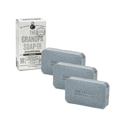 Three bars of handcrafted charcoal soap with a simple box packaging, ideal for Health & Wellness, Grooming and Personal Hygiene, Soaps, USA Made, and Best Sellers collections.