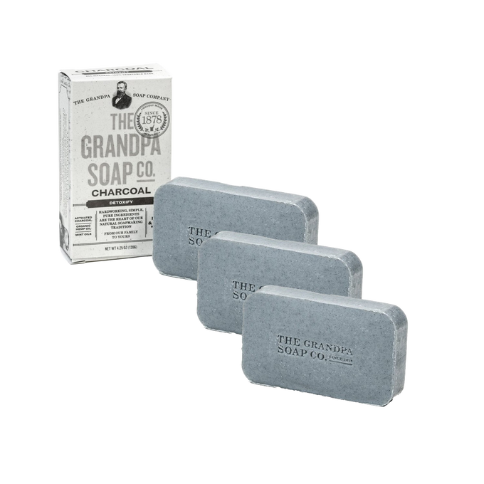Three bars of handcrafted charcoal soap with a simple box packaging, ideal for Health & Wellness, Grooming and Personal Hygiene, Soaps, USA Made, and Best Sellers collections.