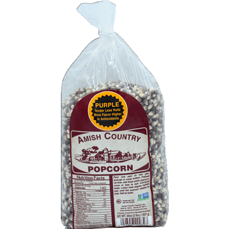 Clear plastic bag filled with tender, purple-hued popcorn kernels with fewer hulls, featuring a traditional label highlighting antioxidant content; ideal for Kitchen & Food and Snacks collections.