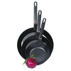 Set of three pre-seasoned steel skillets with long sturdy handles stacked from largest to smallest, accompanied by a fresh red onion, featured in Kitchen & Food, Cookware, Pots and Pans, USA Made, Best Sellers, and Promo Eligible collections.