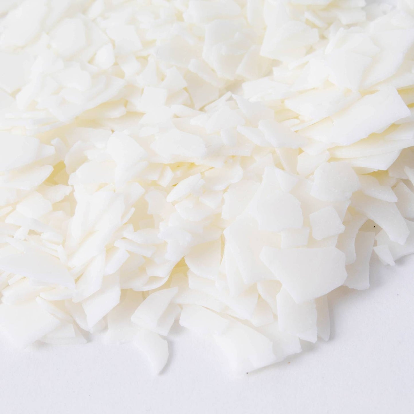 Close-up of handcrafted all-natural soy wax flakes in white, ideal for making container candles, featured in Lamps & Lighting, Candles and Candlemaking, Candlemaking Supplies, Best Sellers, Promo Eligible collections.