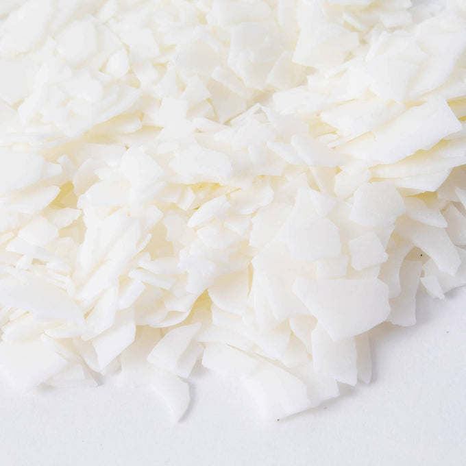 Close-up of handcrafted all-natural soy wax flakes in white, ideal for making container candles, featured in Lamps & Lighting, Candles and Candlemaking, Candlemaking Supplies, Best Sellers, Promo Eligible collections.