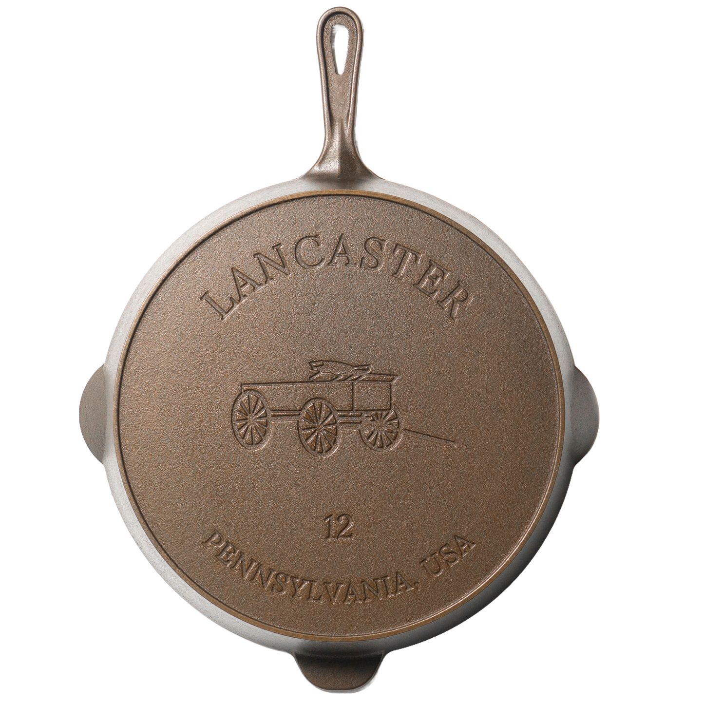 Bottom view of a handcrafted American cast iron skillet featuring embossed design of a horse-drawn wagon and "Lancaster Pennsylvania USA" text, ideal for Kitchen & Food, Cookware, Cast Iron, and USA Made collections.