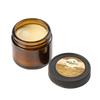 Amber glass jar of all-natural vapor rub with a smooth beeswax and coconut oil-based balm, featuring a round black lid with a beige label, ideal for Health & Wellness and USA Made collections.