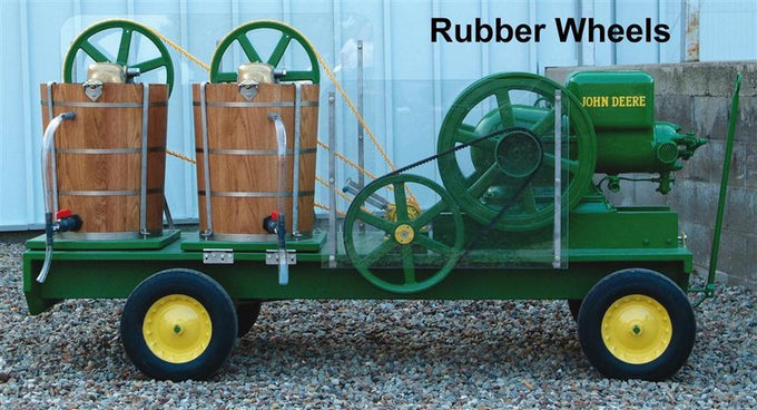 Handcrafted wooden ice cream trailer featuring two 5-gallon freezers powered by a green John Deere engine, mounted on sturdy rubber wheels, part of Specialty Equipment and Making Ice Cream collections.