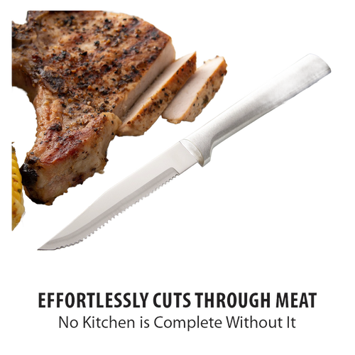 Handcrafted serrated steak knife with high carbon surgical stainless steel blade and solid aluminum handle slicing seasoned grilled pork chop, ideal for Kitchen & Food, Farm, Garden & Tool, and USA Made collections.