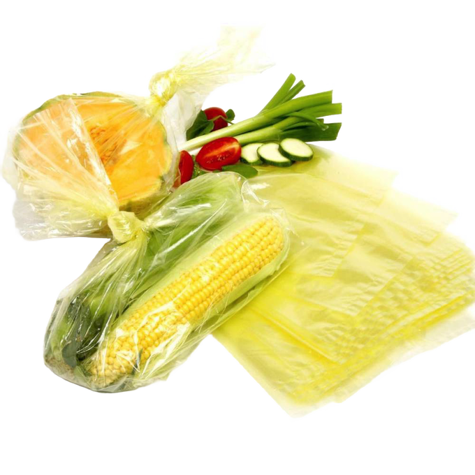 Set of reusable fresh produce bags containing corn, squash, green onions, cherry tomatoes, and cucumber, designed for Kitchen & Food, Storage and Serving, and Best Sellers collections.