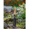 Handcrafted steel trowel with a narrow, heavy-duty head and wooden handle, designed for digging in tight garden spaces, ideal for Farm, Garden & Tool, Digging and Cultivating collections.