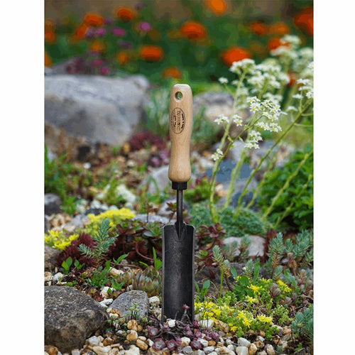 Handcrafted steel trowel with a narrow, heavy-duty head and wooden handle, designed for digging in tight garden spaces, ideal for Farm, Garden & Tool, Digging and Cultivating collections.