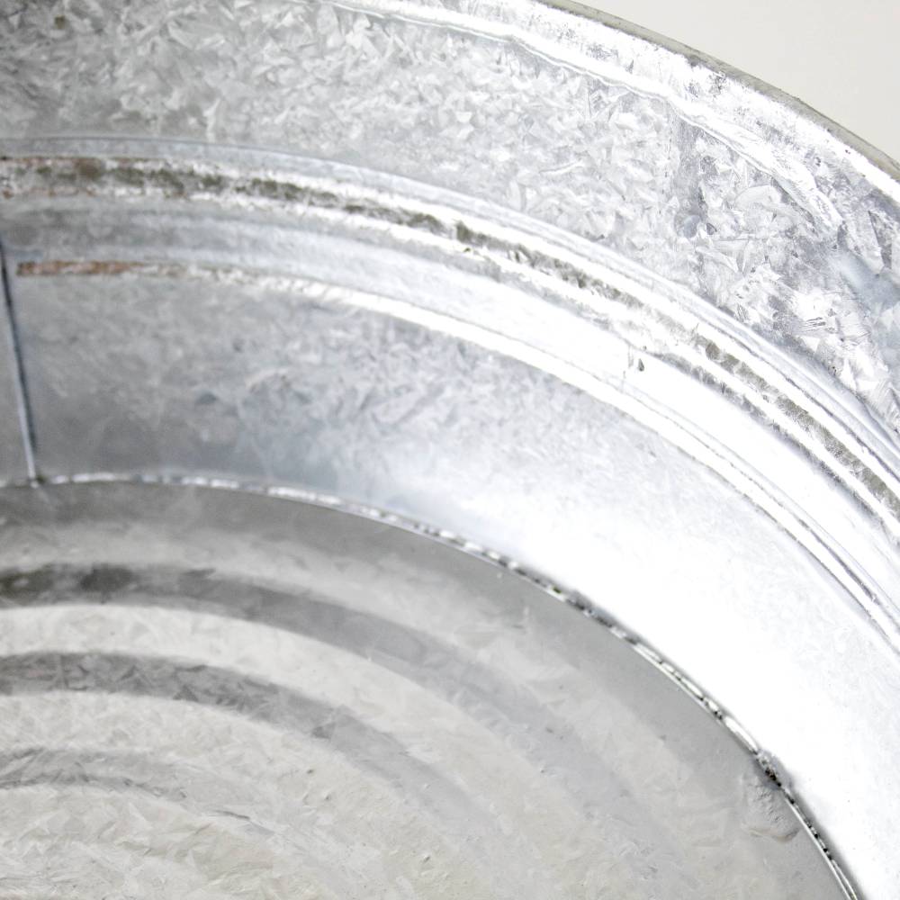 Close-up of a durable handcrafted steel low flat tub with a textured galvanized finish, ideal for indoor and outdoor use in Home & Decor, Farm, Garden & Tool, and Animal Care collections.