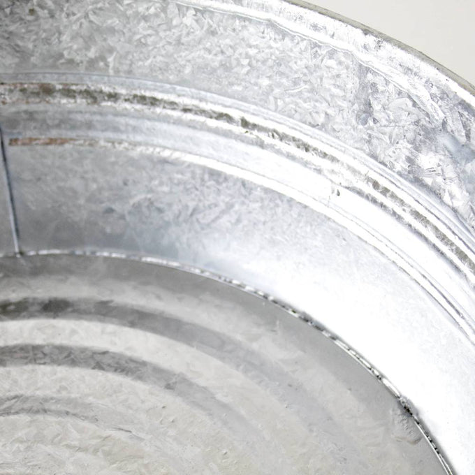 Close-up of a durable handcrafted steel low flat tub with a textured galvanized finish, ideal for indoor and outdoor use in Home & Decor, Farm, Garden & Tool, and Animal Care collections.