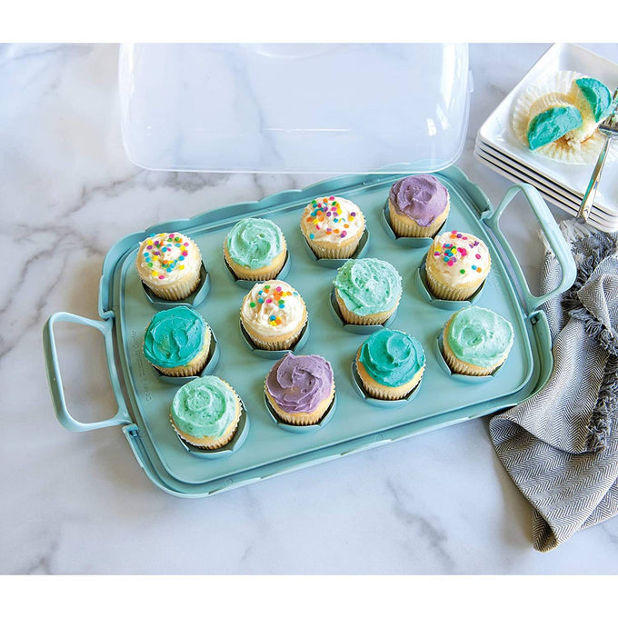 Light blue reversible cake and cupcake carrier with clear domed lid open to show a dozen decorated cupcakes, featuring snap-lock handles and scalloped edging, USA Made Kitchen & Food essential.