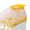 Electric hot air popcorn popper with yellow accents actively popping fresh popcorn through a clear plastic chute, ideal for Kitchen & Food, Popcorn, Kitchen Gadgets, and Best Sellers collections.