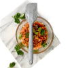 Marble-patterned flexible silicone spatula resting on a glass bowl of fresh salsa with cilantro, set on a marble surface, ideal for Kitchen & Food, Cookware, and Baking Supplies collections.