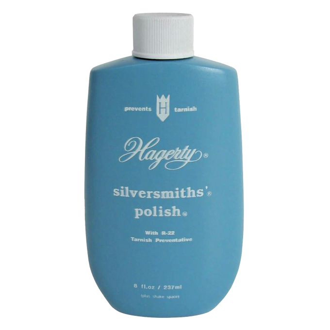 Blue bottle of Hagerty silver polish designed to clean, protect, and preserve silver and gold surfaces, featured in Home & Decor and Household Cleaning collections.