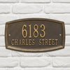 Raised bronze wall plaque displaying house number and street name with a decorative border, handcrafted and made in USA, featured in Home & Decor and Mailboxes and Address Signs collections.