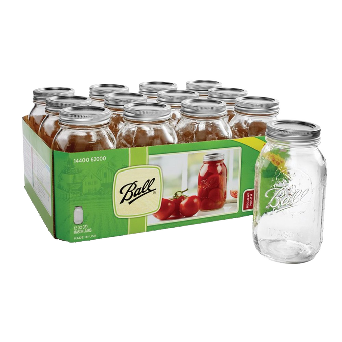 Case of twelve clear glass regular-mouth canning jars with metal lids, featuring embossed logo and packaging depicting preserved tomatoes, ideal for Kitchen & Food, Food Preservation, Canning, USA Made, Best Sellers, and Promo Eligible collections.