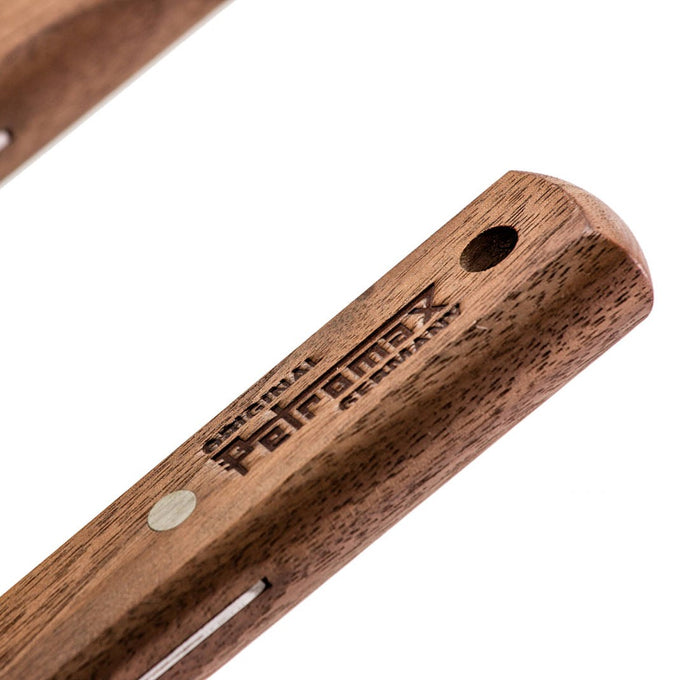 Close-up of a smooth walnut wood handle with an engraved logo for a flexible spatula, crafted for durability and comfort in Kitchen Gadgets, Grilling, and Cooking Helpers collections.