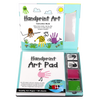 Open art kit featuring a handprint art pad with colorful stamps, ink pads in pink and green, and an instruction booklet for kids' creative arts and crafts projects.