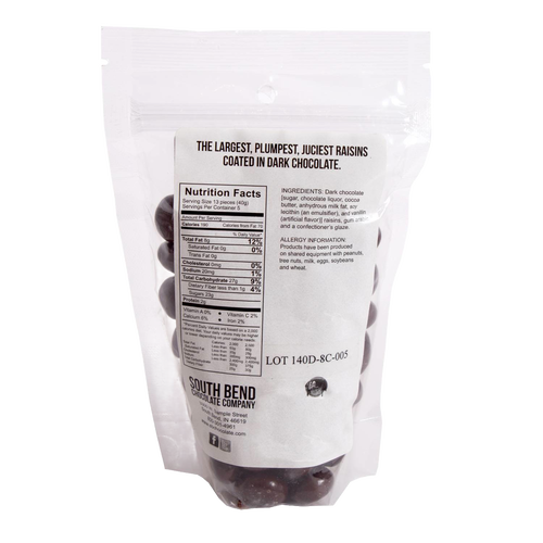 Back of resealable bag displaying nutrition facts and ingredients for handcrafted dark chocolate covered raisins made in USA, featured in Kitchen & Food, Snacks and Sweets, Candy, USA Made, Best Sellers, and Promo Eligible collections.