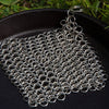 Handcrafted stainless steel chainmail scrubber designed for cleaning cast and wrought iron cookware, featured in Home & Decor, Household Cleaning, and Cleaning Utensils and Gadgets collections.