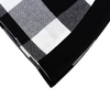 Handcrafted buffalo check tree skirt with bold black and white pattern, made of soft cotton, ideal for adding cozy country charm to holiday decor in Home & Decor, Holiday Decor, Best Sellers, Promo Eligible collections.