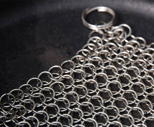 Stainless steel chainmail cleaner designed for scrubbing cast and wrought iron cookware, handcrafted and featured in Home & Decor, Household Cleaning, and Cleaning Utensils collections.