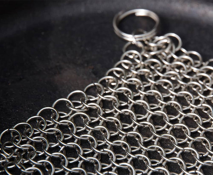 Stainless steel chainmail cleaner designed for scrubbing cast and wrought iron cookware, handcrafted and featured in Home & Decor, Household Cleaning, and Cleaning Utensils collections.