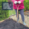 Person wearing gloves and pink jacket holding a traditional-style border fork with a stainless steel head and wooden handle, positioned over garden soil, suitable for Farm, Garden & Tool, Digging and Cultivating, Garden Accessories, Lawncare, Best Sellers, and Promo Eligible collections.