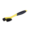Yellow and black cleaning brush with two nylon bristle heads and molded plastic handle, designed for detailed cleaning of corners and grooves in cast iron cookware, ideal for Kitchen & Food, Cookware, Cast Iron, Best Sellers, and Promo Eligible collections.