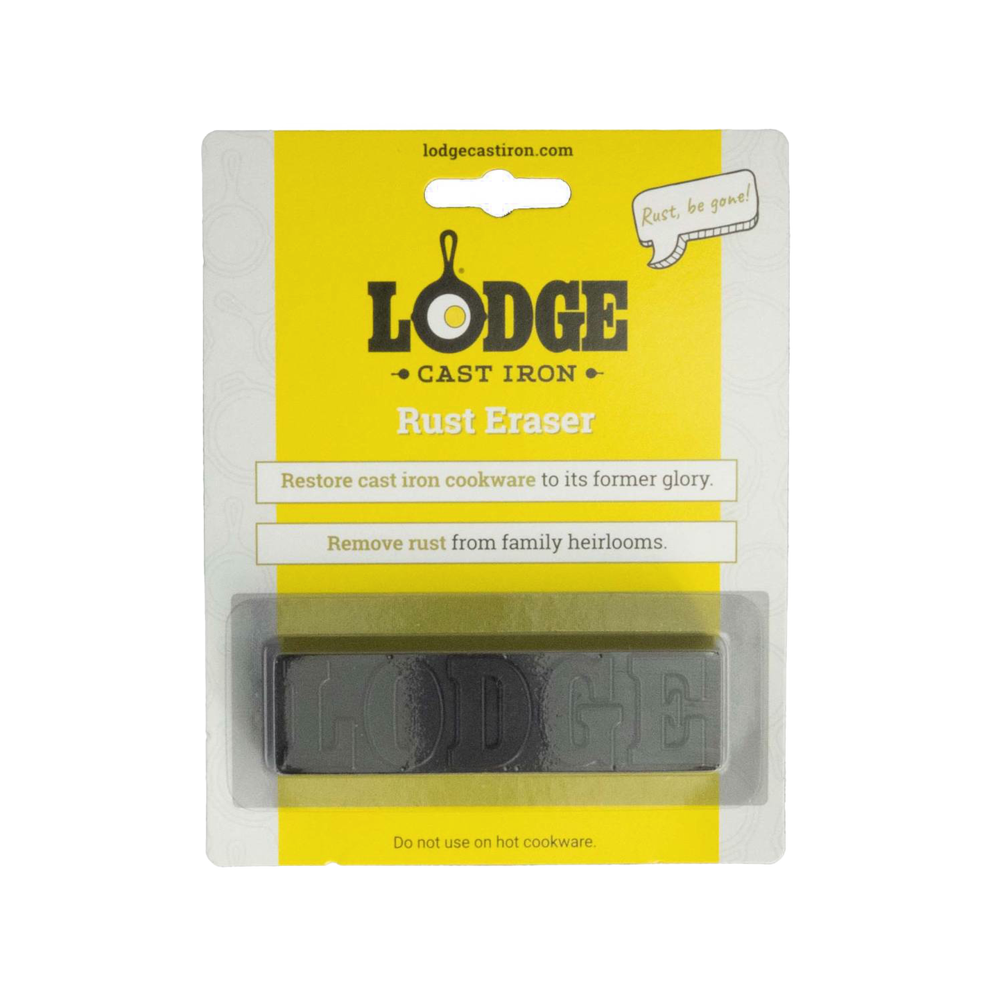 Rectangular rust eraser bar embossed with "LODGE" in clear packaging with yellow and white backing, designed for restoring cast iron cookware, featured in Kitchen & Food and Household Cleaning collections.