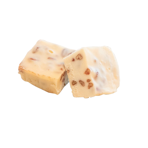 Two handcrafted creamy white fudge squares with embedded walnut pieces, showcasing a smooth, melt-in-your-mouth texture from a unique Amish-made recipe, featured in Kitchen & Food, Snacks and Sweets, USA Made, Best Sellers, Promo Eligible collections.