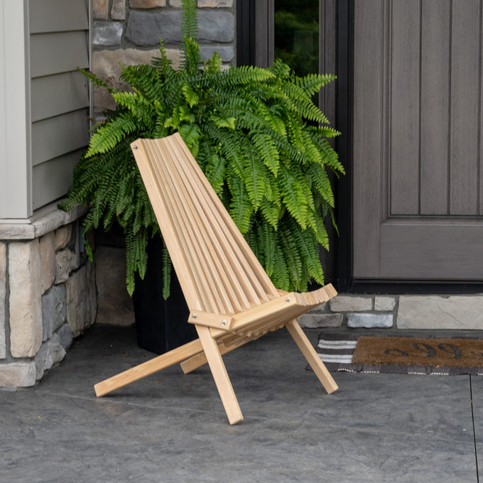 Handcrafted folding chair made of solid cypress wood, designed for comfort and durability, perfect for outdoor use in Home & Decor, Camping, and Outdoor Furniture collections.