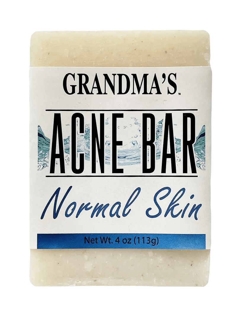 Handcrafted acne soap bar labeled for normal skin, featuring soothing ingredients, designed to help clear blemishes, part of Health & Wellness and Best Sellers collections.