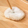 Handcrafted lamb's wool mop head with natural lanolin shown on hardwood floor, designed for dusting and cleaning in Home & Decor and Household Cleaning collections.