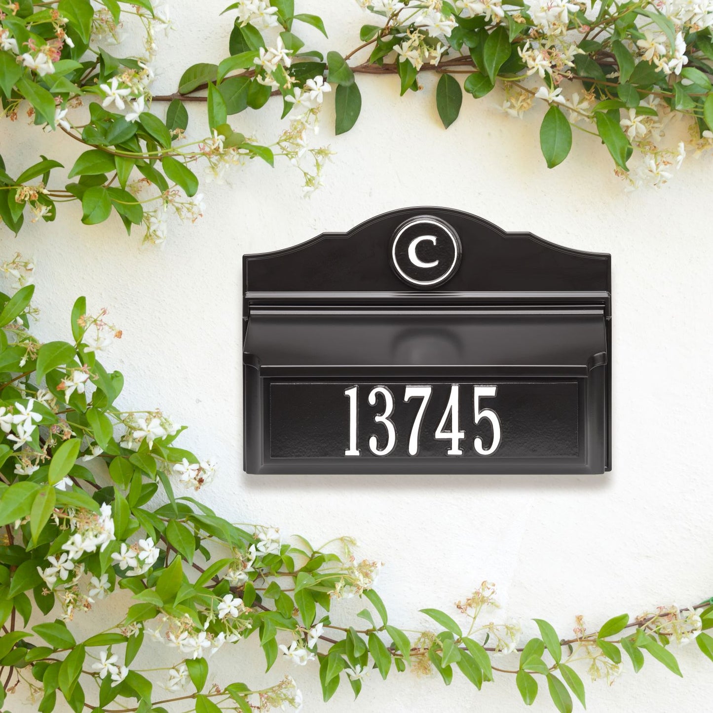 Handcrafted black and white custom wall mount mailbox with raised house number and circular monogram, enhancing curb appeal, featured in Home & Decor, Mailboxes and Address Signs, USA Made, and Best Sellers collections.