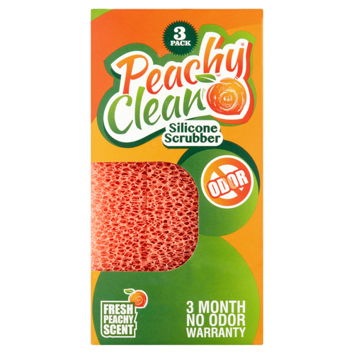 Set of three peach-colored silicone scrubbing pads in bright orange and green packaging, designed for household cleaning and USA made with a three-month no-odor warranty.