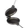 Handcrafted cast iron round pie iron with metal handle and wood grips, designed for outdoor cooking, featured in Farm, Garden & Tool, Camping, and Best Sellers collections.