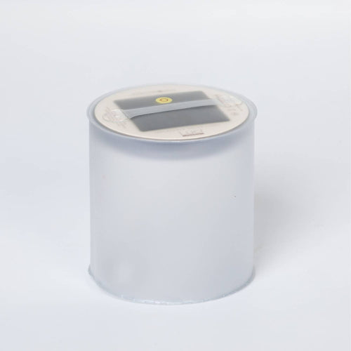 Inflatable solar candle with frosted translucent body and built-in solar panel on top, designed for safe, flameless lighting in outdoor, camping, and emergency settings.