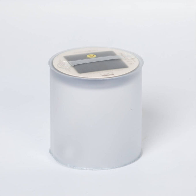 Inflatable solar candle with frosted translucent body and built-in solar panel on top, designed for safe, flameless lighting in outdoor, camping, and emergency settings.