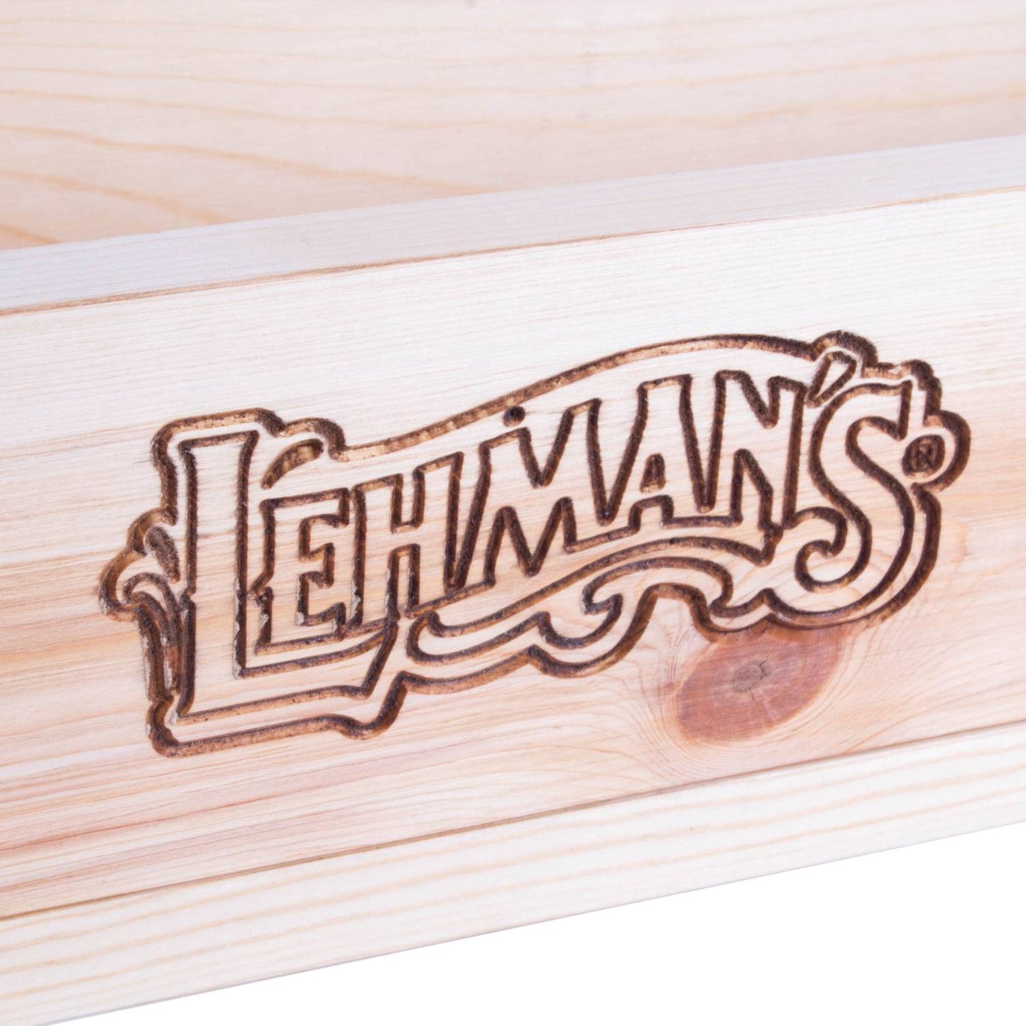 Close-up of handcrafted durable pine wooden soap mold featuring engraved Lehman's logo, designed for cold process soapmaking in Health & Wellness and USA Made collections.