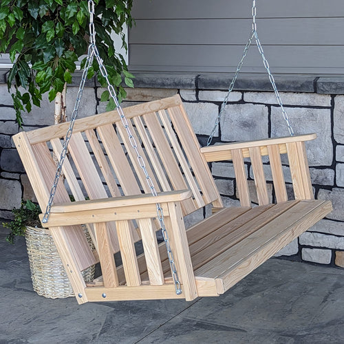 Handcrafted hanging porch swing made from low-maintenance cypress wood with slatted back and seat, suspended by sturdy metal chains, perfect for outdoor furniture and home decor collections.