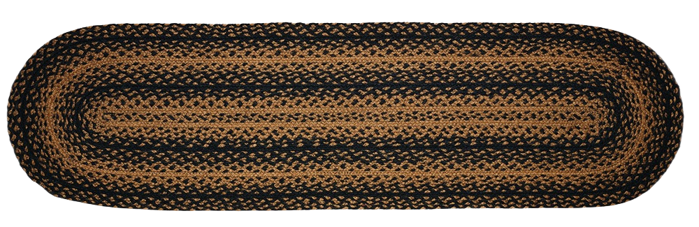Oval braided rug in warm brown and black tones, showcasing traditional craftsmanship, perfect for cozy Kitchen & Food, Food Preservation, and best seller home settings.