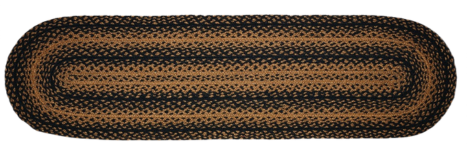 Oval braided rug in warm brown and black tones, showcasing traditional craftsmanship, perfect for cozy Kitchen & Food, Food Preservation, and best seller home settings.