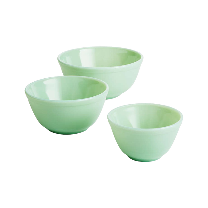 Set of three handcrafted pale green glass mixing bowls in varying sizes, ideal for kitchen and food prep, USA made and featured in Cookware, Baking Supplies, Dinnerware, and Best Sellers collections.