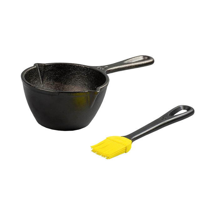 Black cast iron melting pot with spouts and long handle paired with a yellow silicone brush, ideal for Kitchen & Food, Cookware, Cast Iron, and Best Sellers collections.