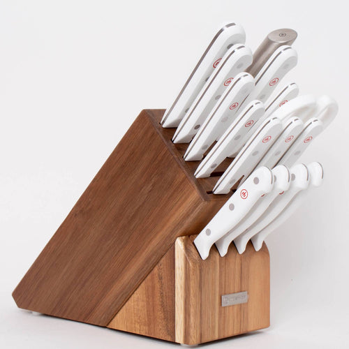 Wooden knife block set holding knives with white handles, featuring a 16-piece Wusthof Gourmet collection, ideal for Farm, Garden & Tool, Kitchen & Food, and Knives & Axes categories.