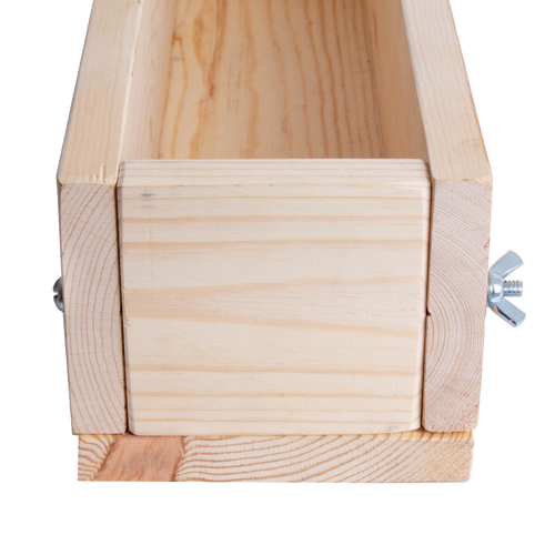 Front view of a handcrafted wooden soap loaf mold made from durable pine with adjustable end secured by metal wingnuts, featured in Health & Wellness and Soapmaking Supplies collections.